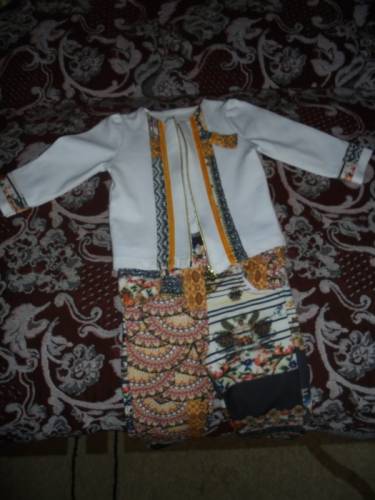 Продам брючный костюм для девочки